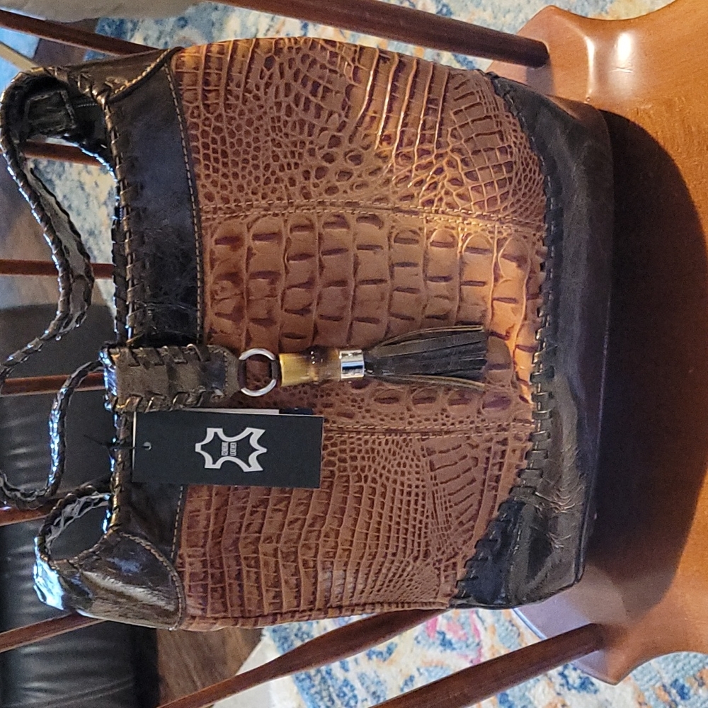 NWT crocodile print handbag.
